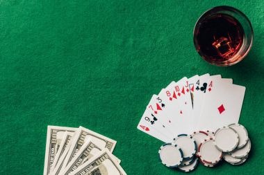 Live baccarat dealer table showing card layout and payout display